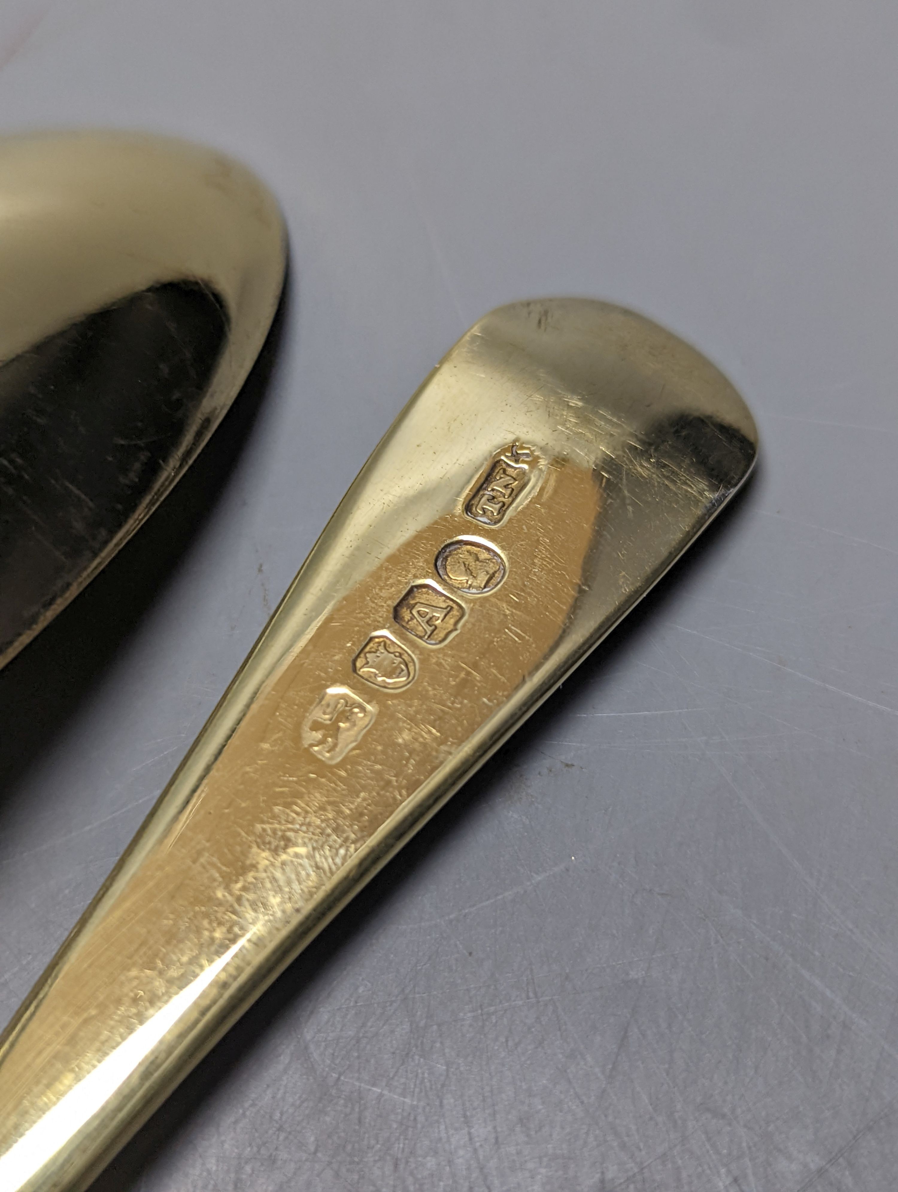 A set of 4 George III parcel gilt silver spoons, with engraved decoration, Thomas Northcote, London, 1796, 21.2cm